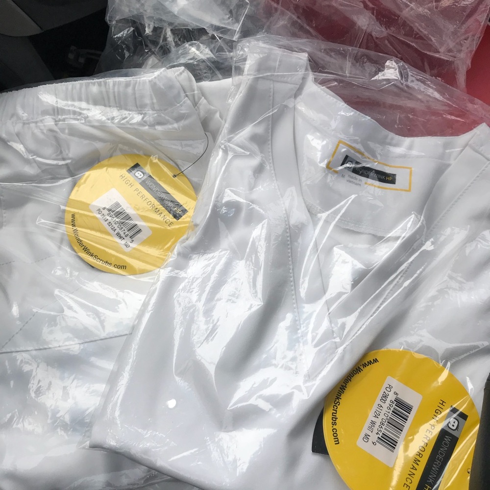 Brand new wonder wink white scrubs set.